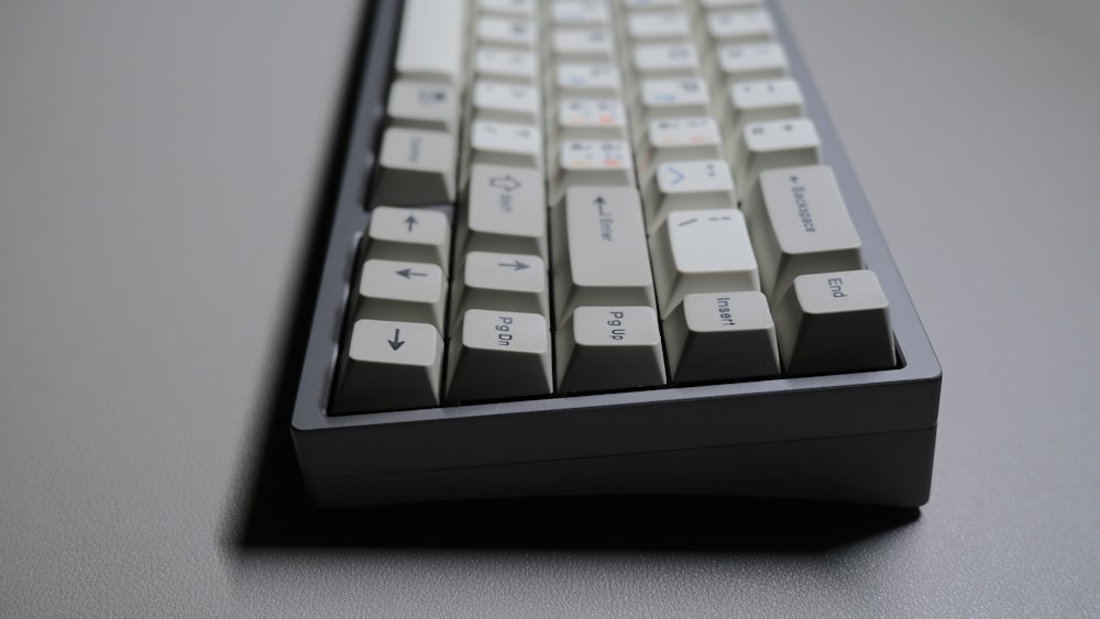 white computer keyboard on white table