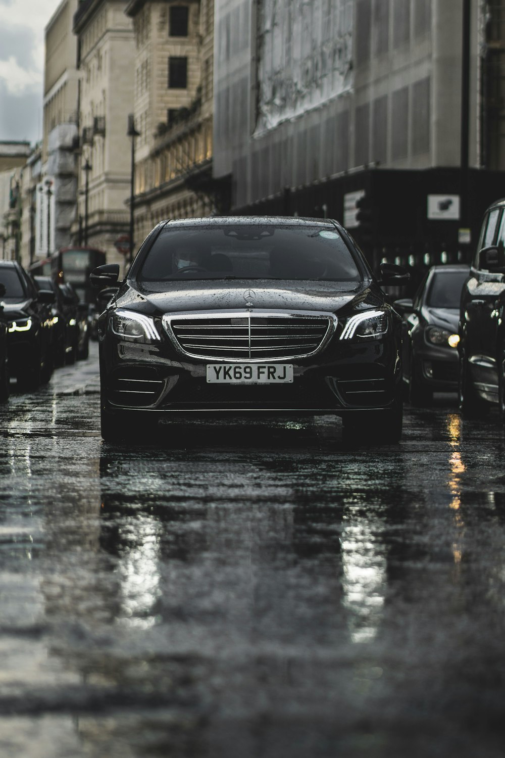 black mercedes benz car on road during daytime