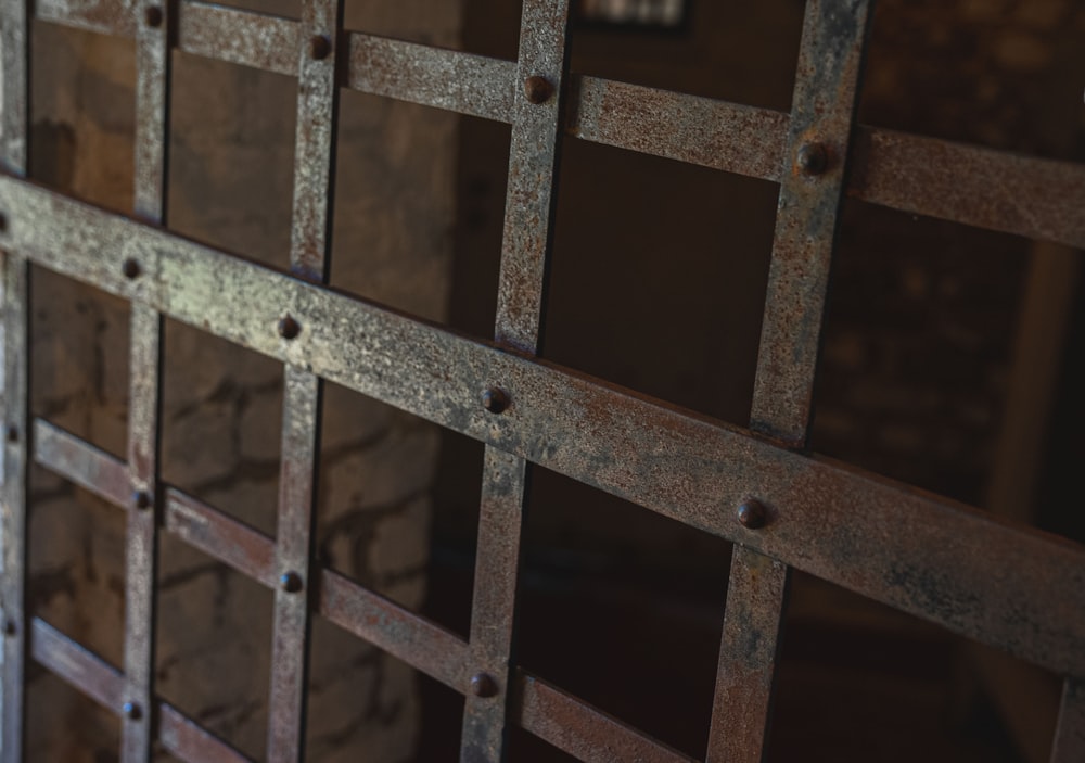 brown metal fence during daytime