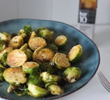 cooked food on black ceramic plate