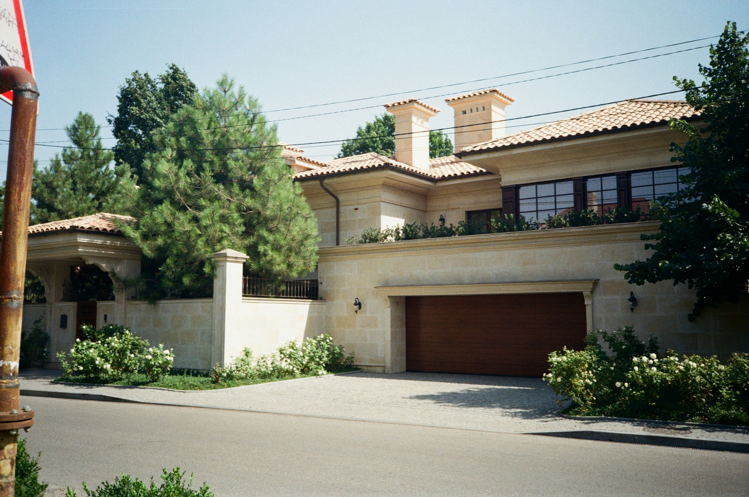 woman wearing yellow long-sleeved dress under white clouds and blue sky during daytime