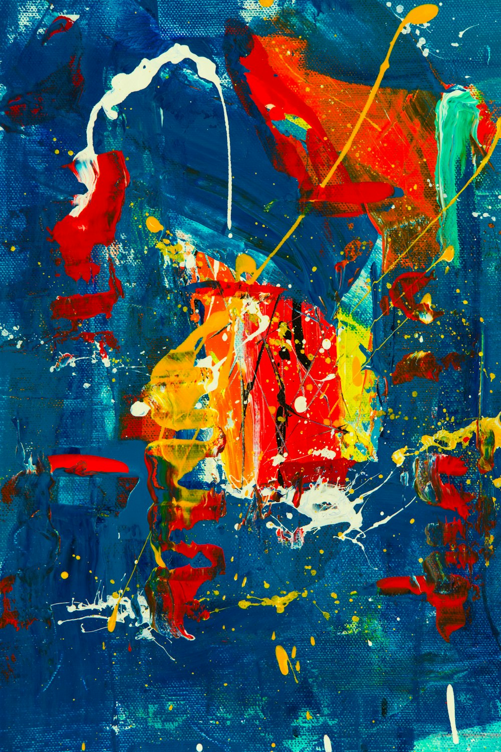 peinture abstraite rouge, jaune et bleu