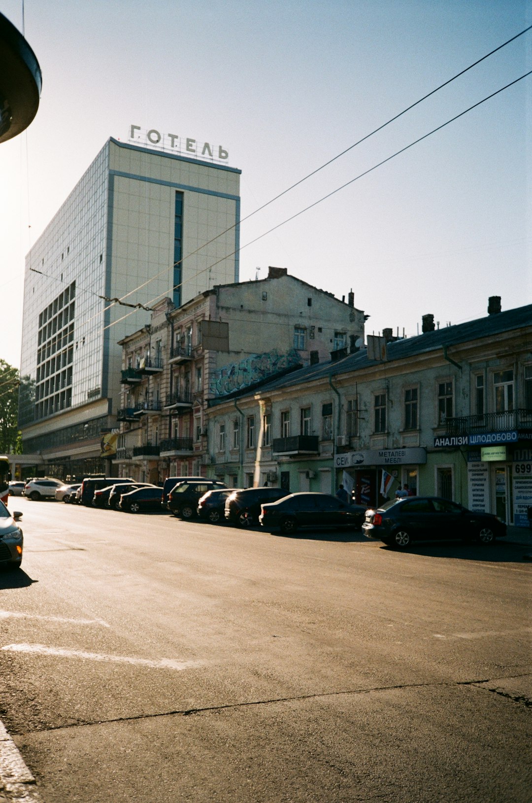 cars parked in front of building during daytime