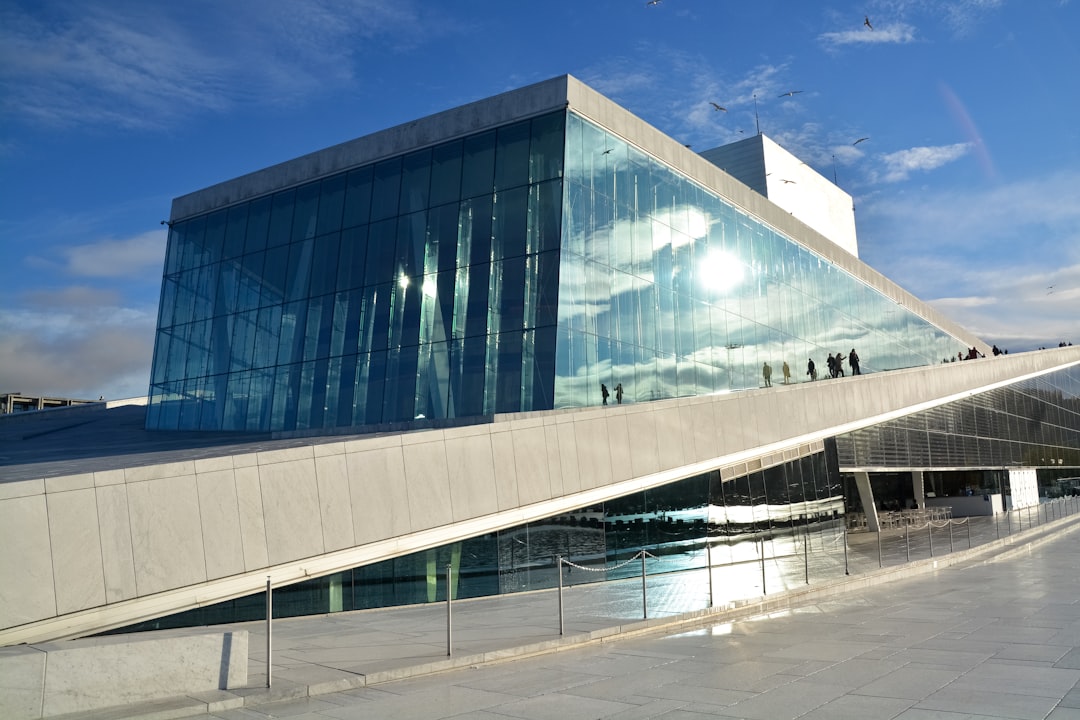 glass building under blue sky during daytime