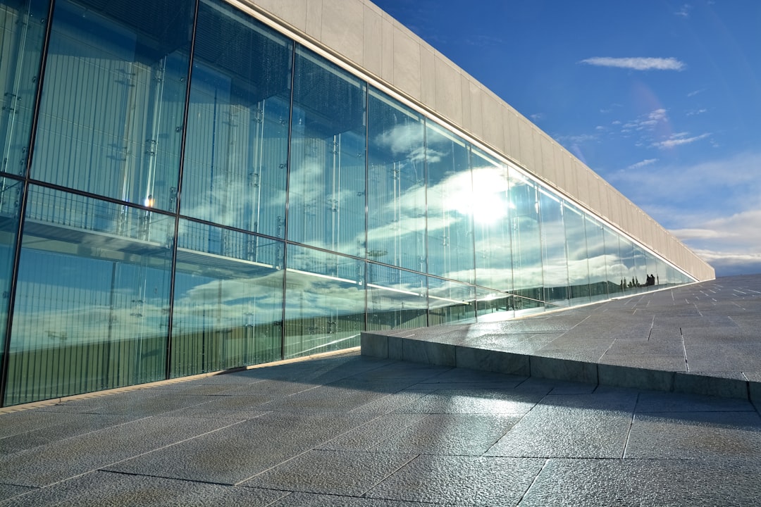 clear glass building under blue sky during daytime