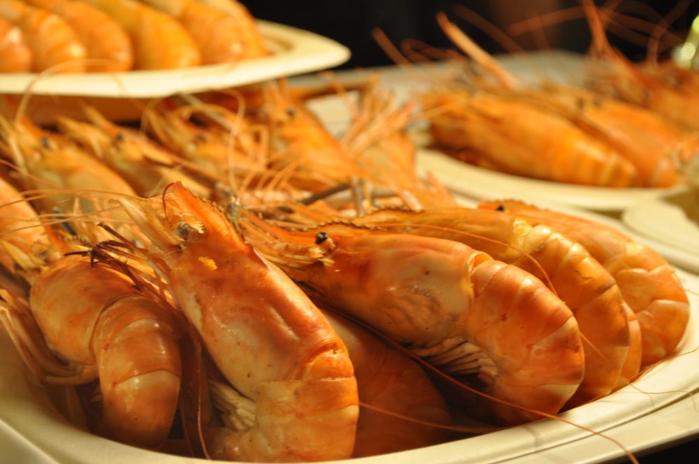 cooked shrimp on white ceramic plate