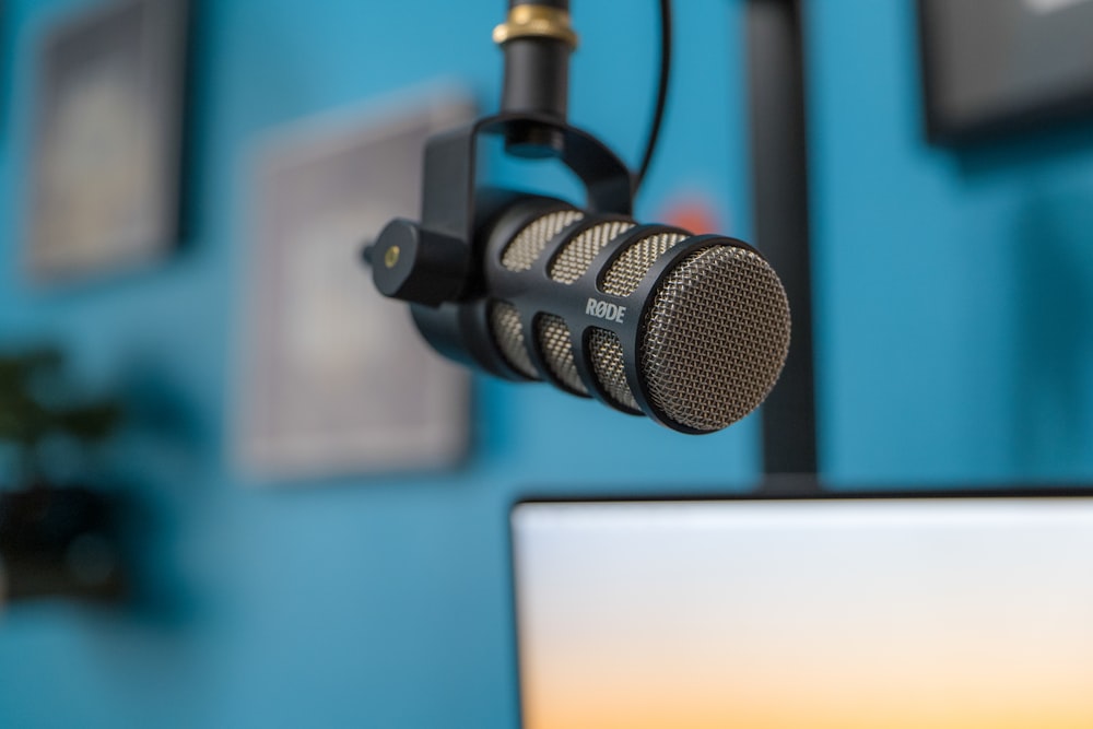 black and silver microphone on black stand