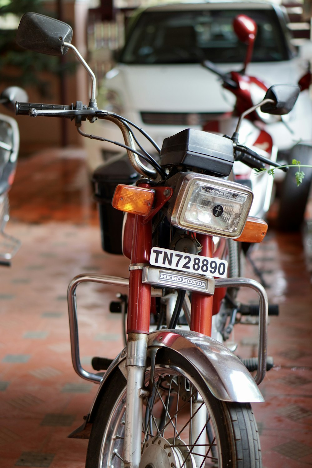 red and black motorcycle in tilt shift lens