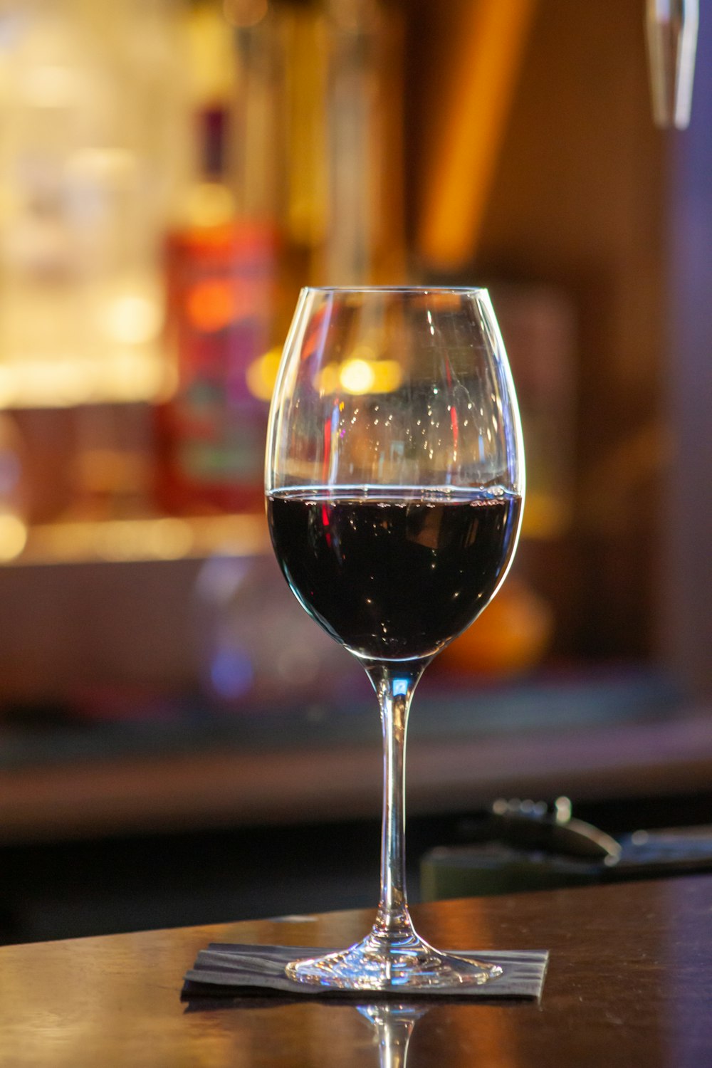 clear wine glass with red wine