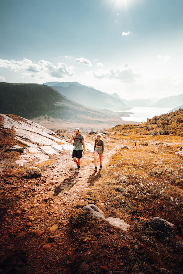 A couple standing together enjoying an outdoor view