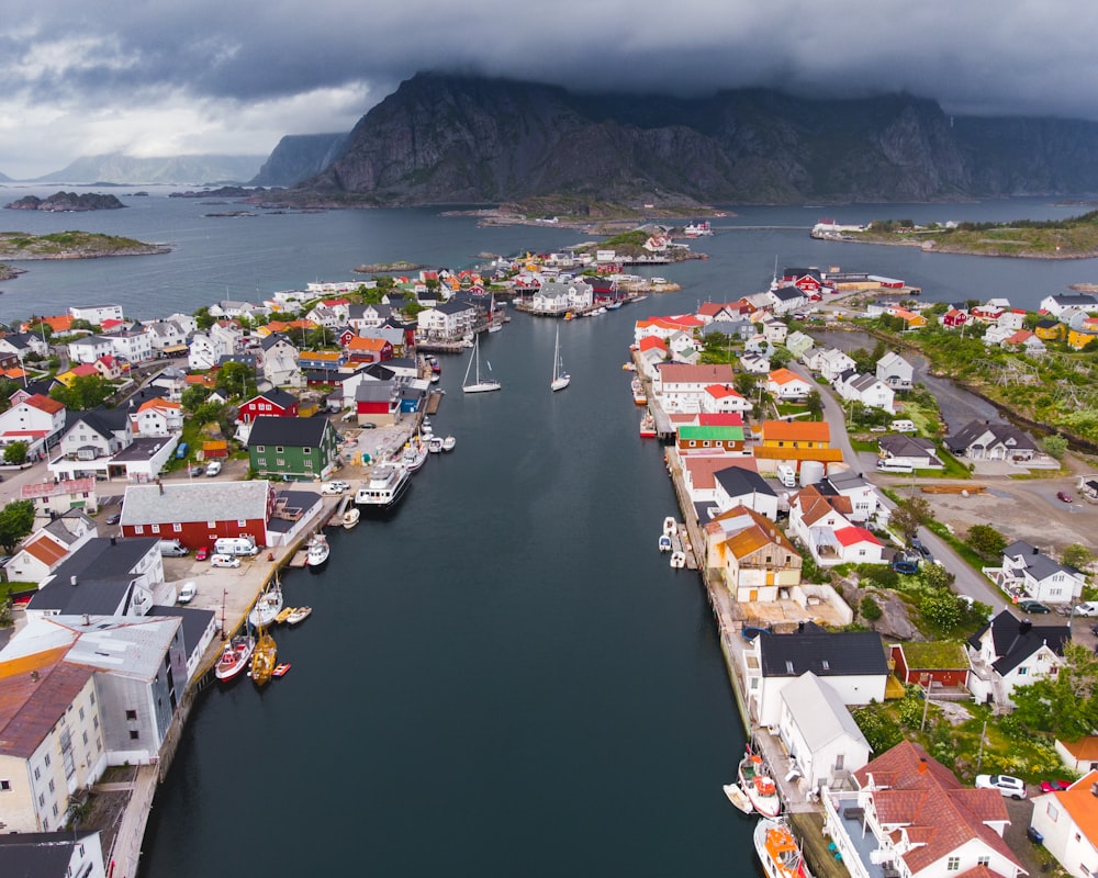 aerial view of city near body of water during daytime