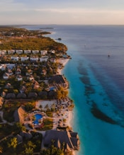 aerial view of city near body of water during daytime