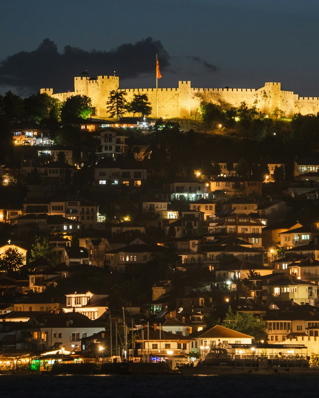 city with high rise buildings during night time