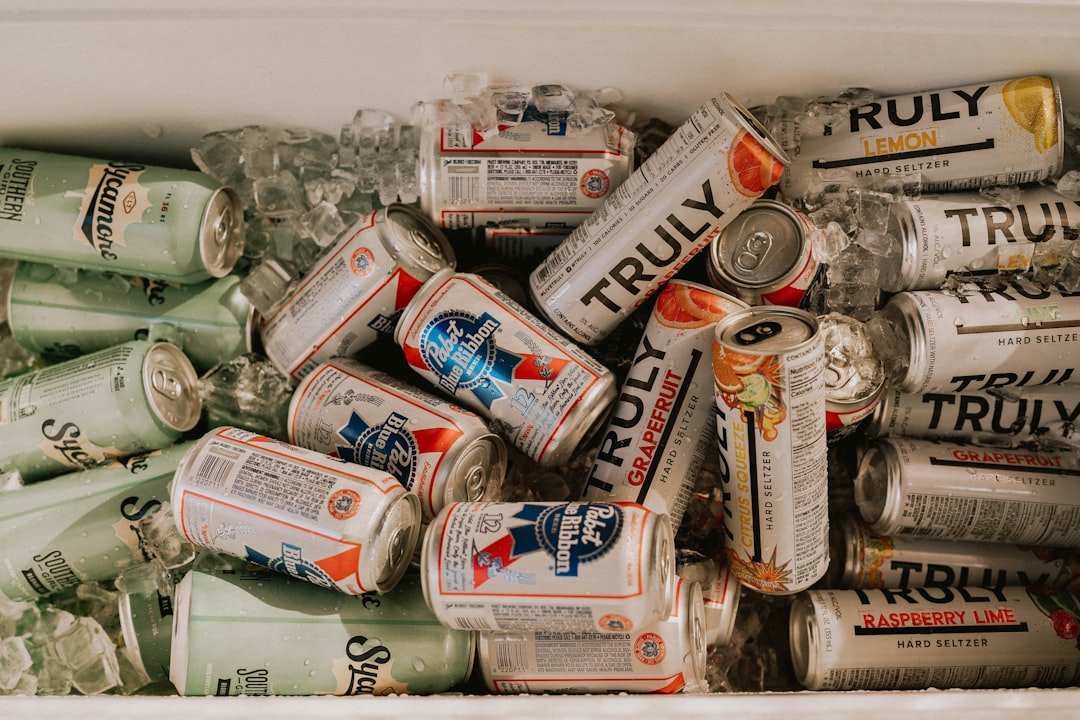  assorted cans and cans on white table cooler