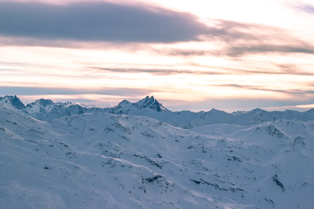 snow covered mountain during daytime