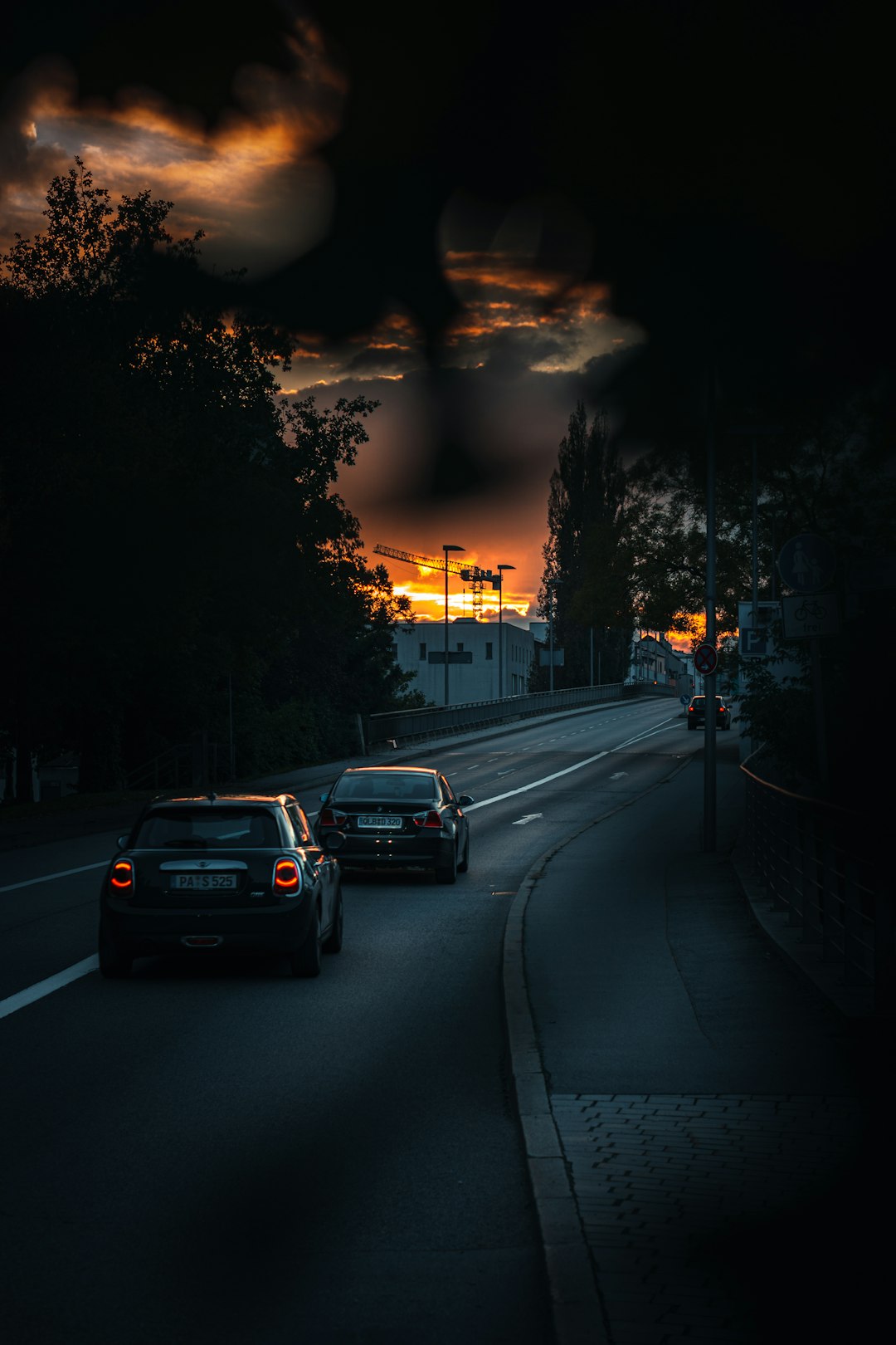 cars on road during sunset