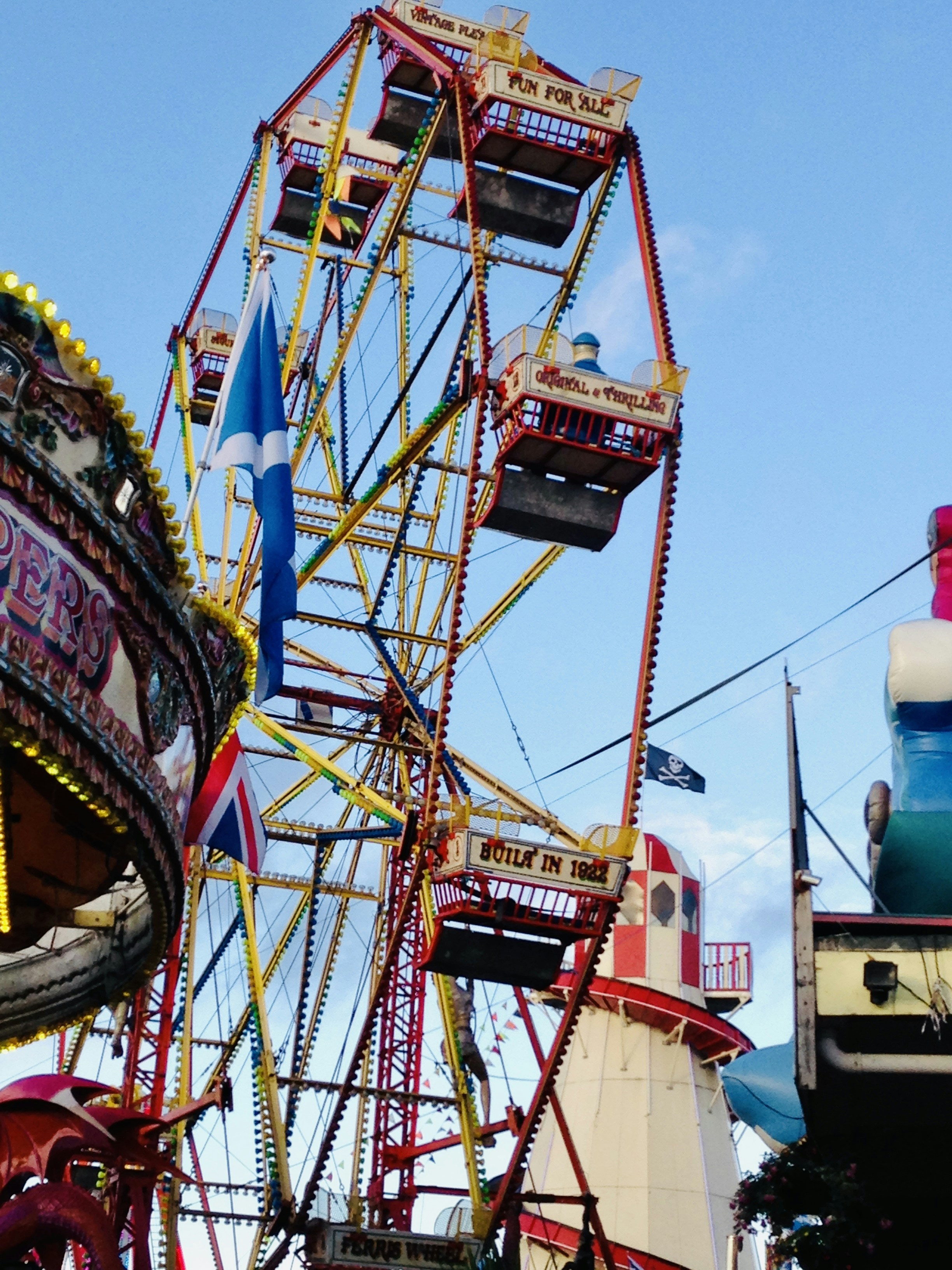 yellow and red ferris wheel