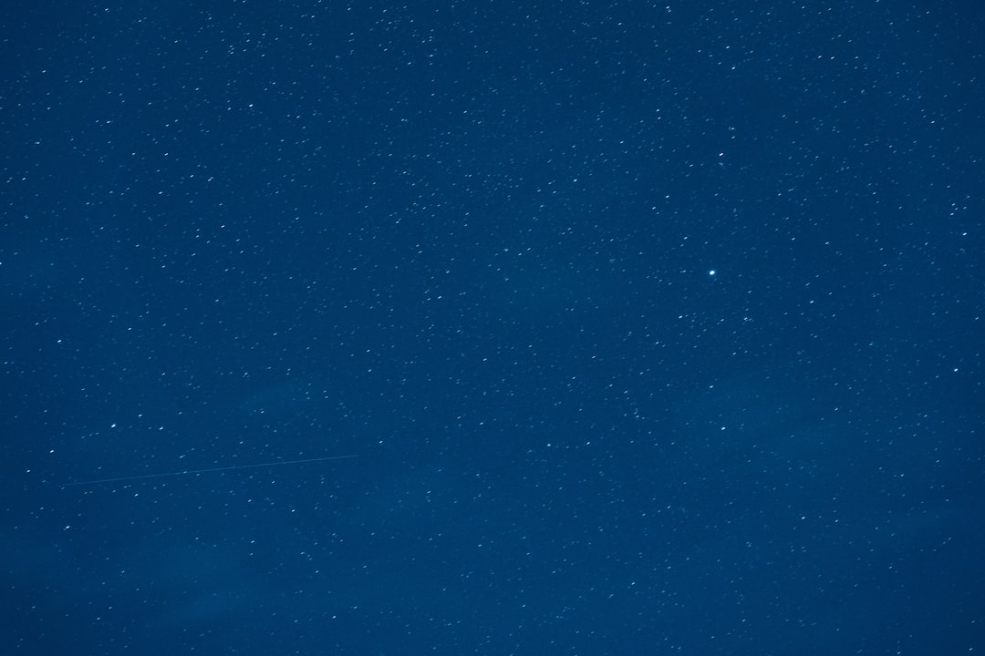 blue sky with stars during night time