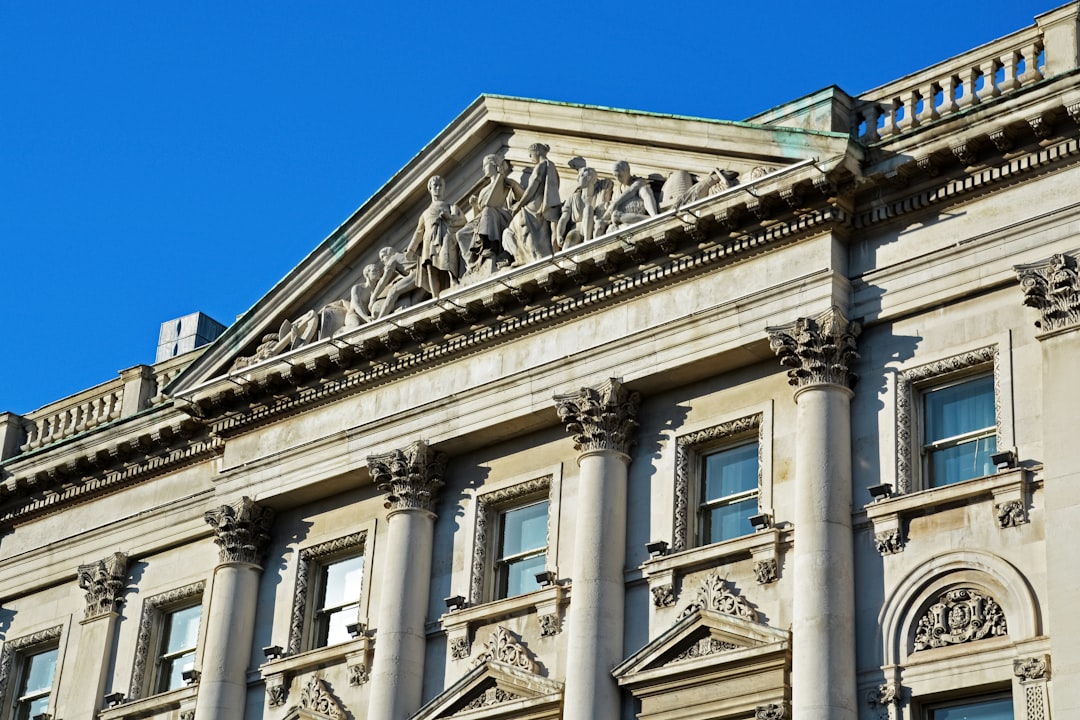 white concrete building under blue sky during daytime