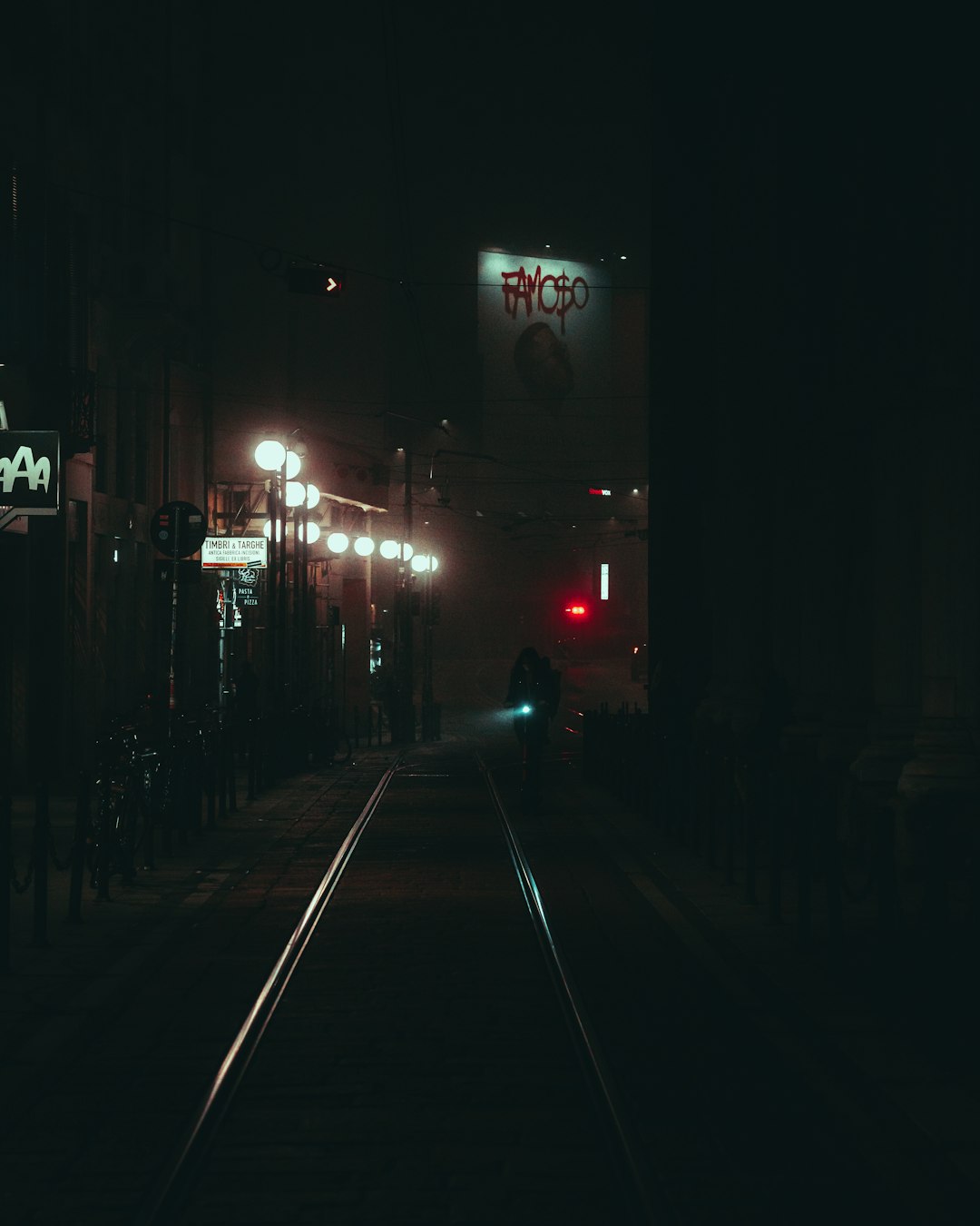 black car on road during night time