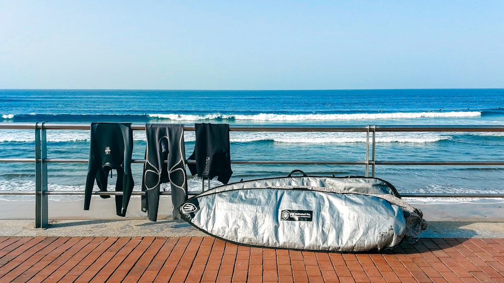 white and black boat on sea during daytime