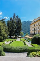 green trees near brown building during daytime