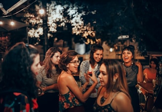 woman in black and red floral tube dress