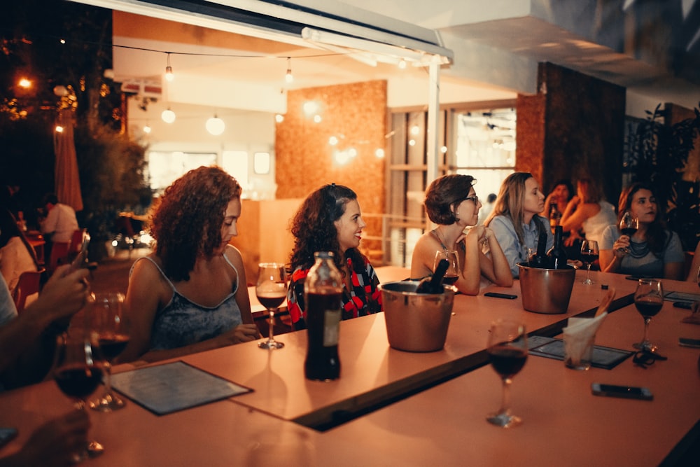 people sitting on chair in restaurant