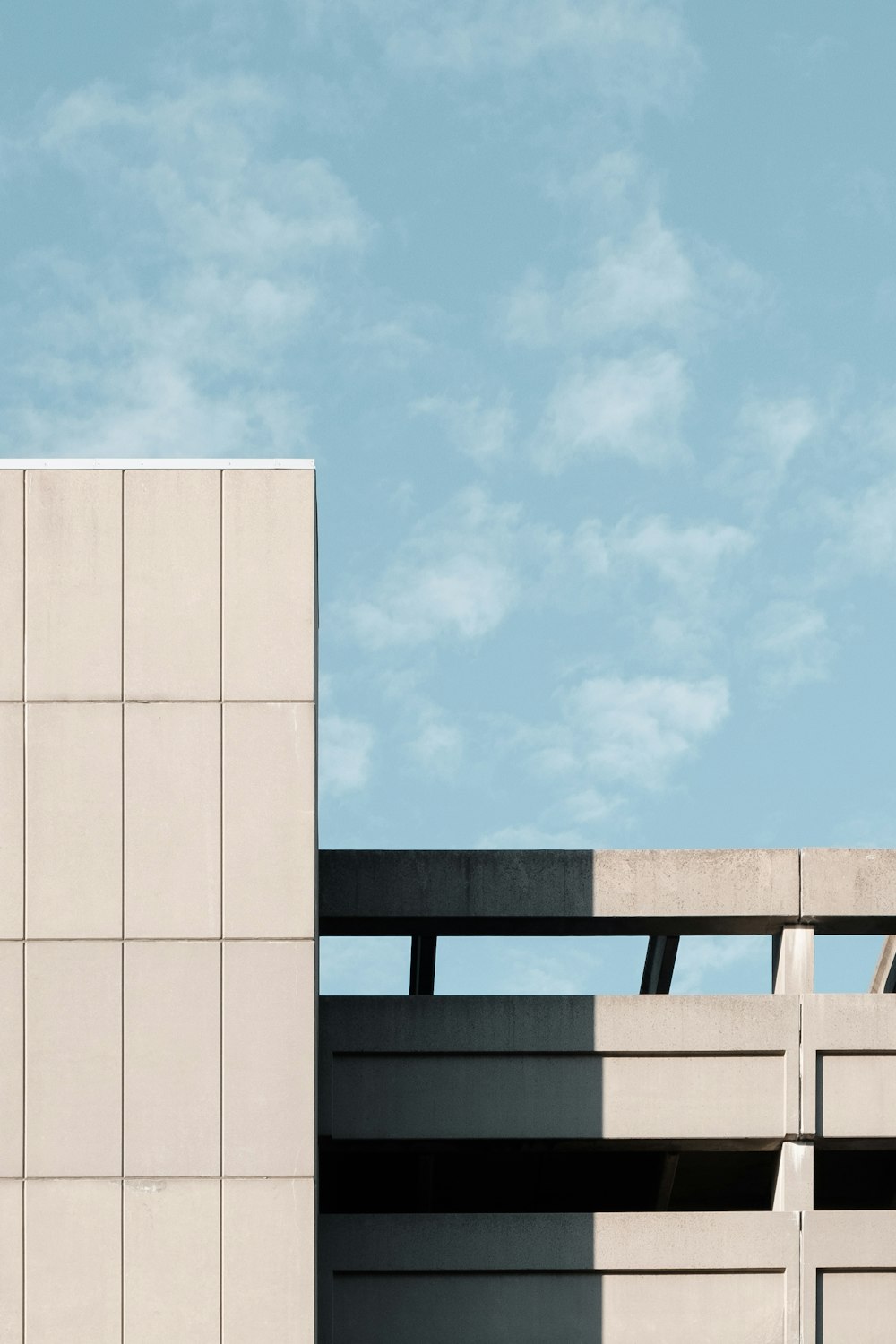 white concrete building under blue sky during daytime