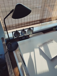 black desk lamp on white table