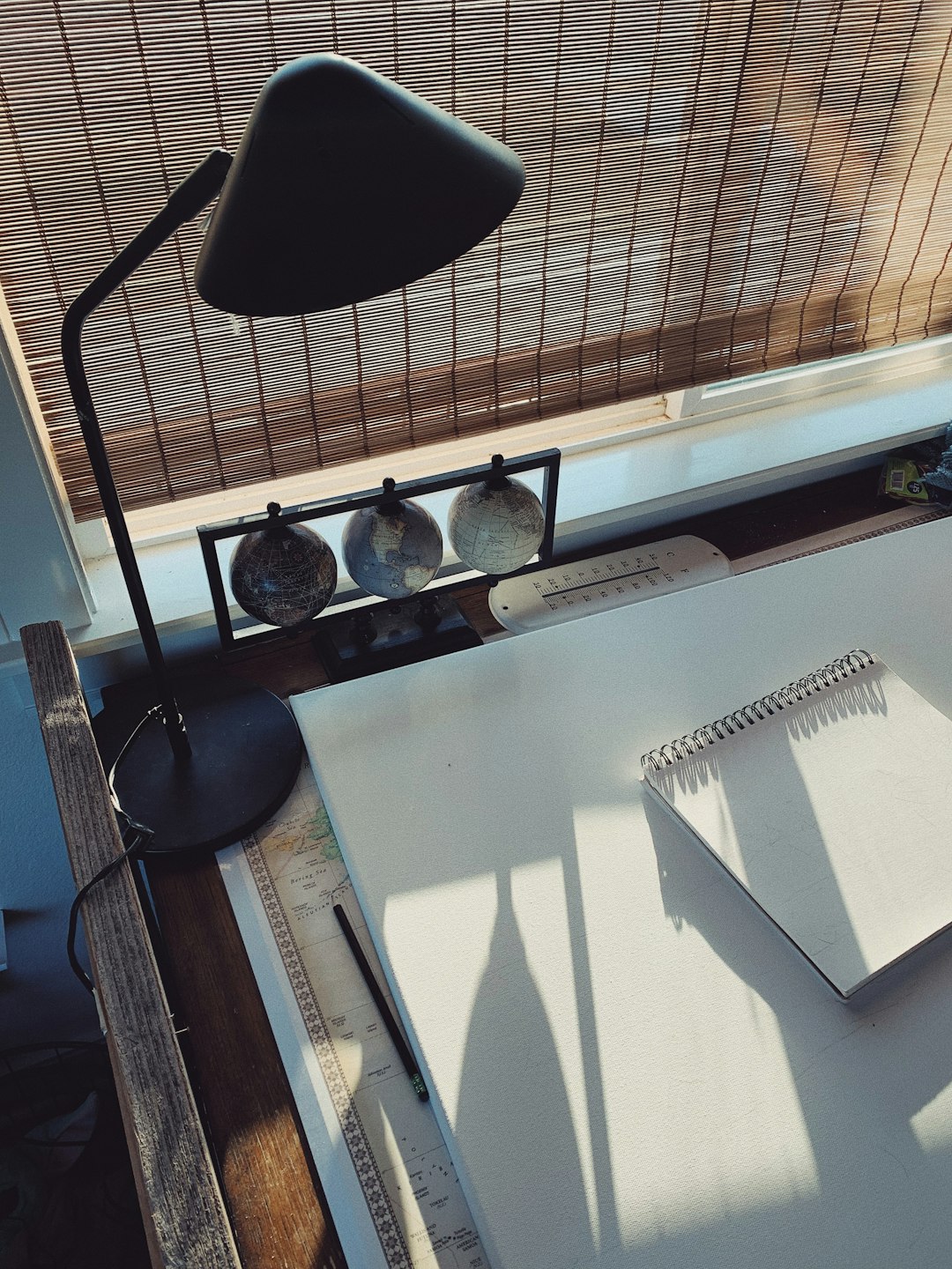 black desk lamp on white table