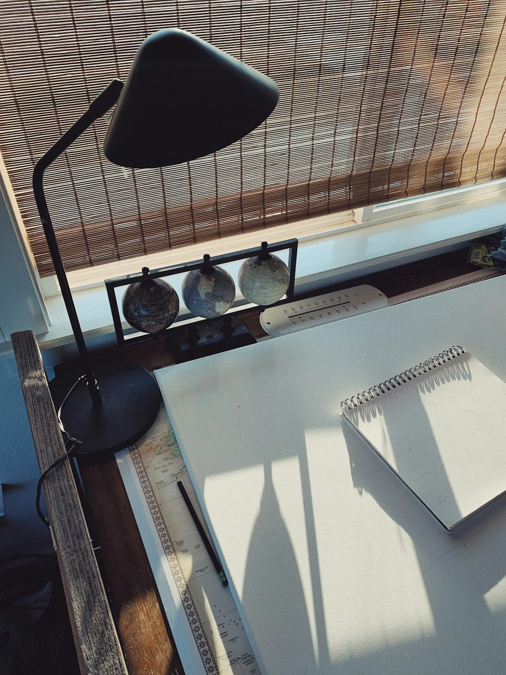 black desk lamp on white table