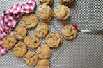 cookies on white and red textile
