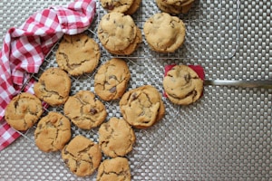 cookies on white and red textile