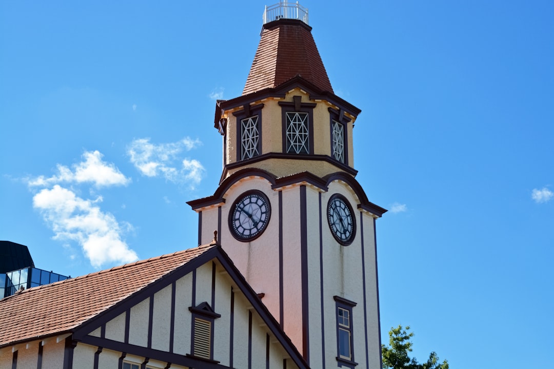 white and brown concrete building under blue sky during daytime