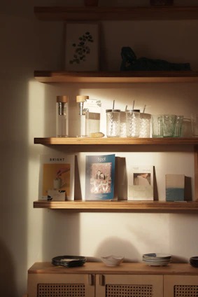 white and blue labeled pack on white wooden shelf