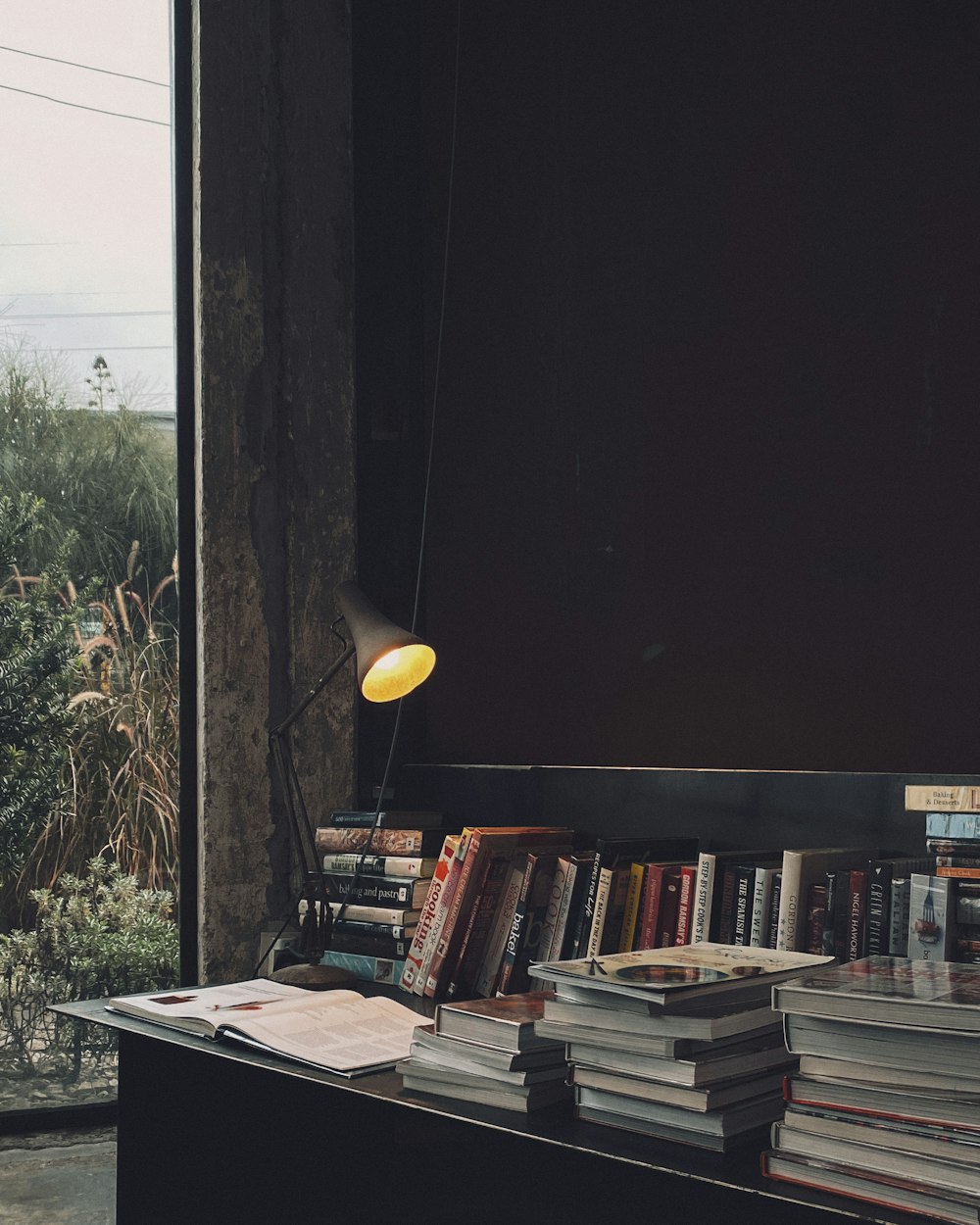 books on white wooden shelf