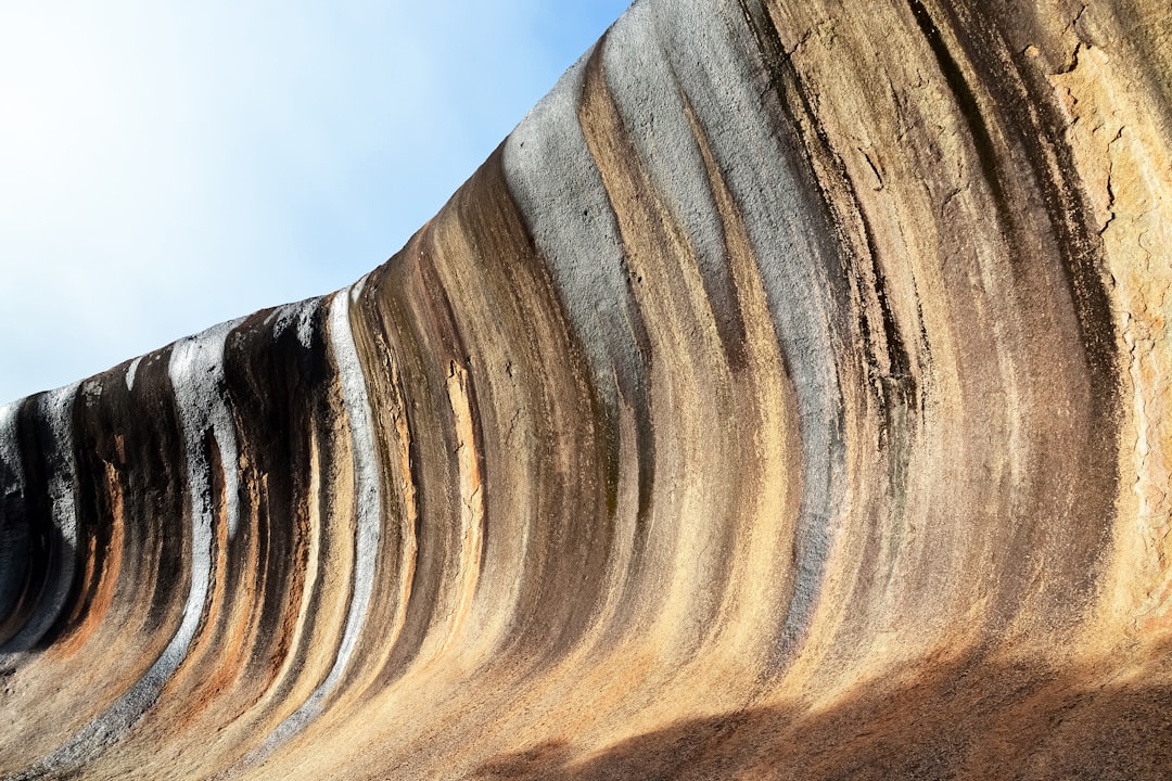 brown and gray rock formation under blue sky during daytime