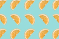 sliced orange fruits on white background