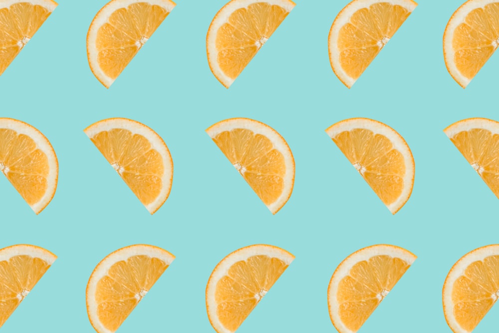 sliced orange fruits on white background