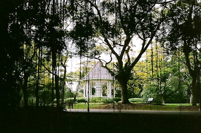A cozy gazebo surrounded by lush greenery in Taman Wisata Kableki.