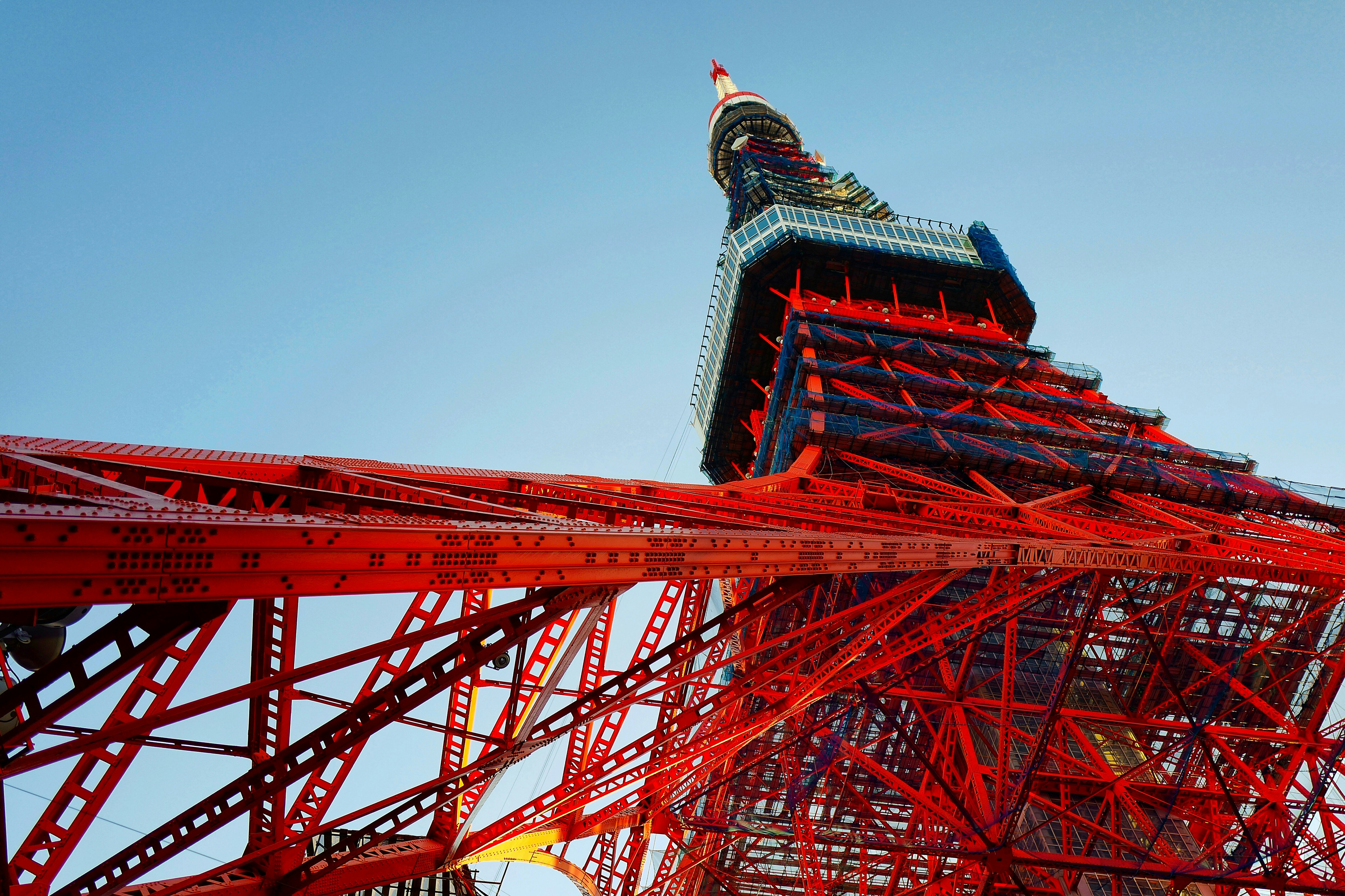 red and green tower under blue sky