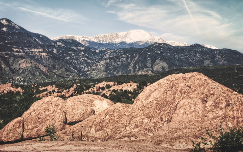 brown rocky mountain under blue sky during daytime