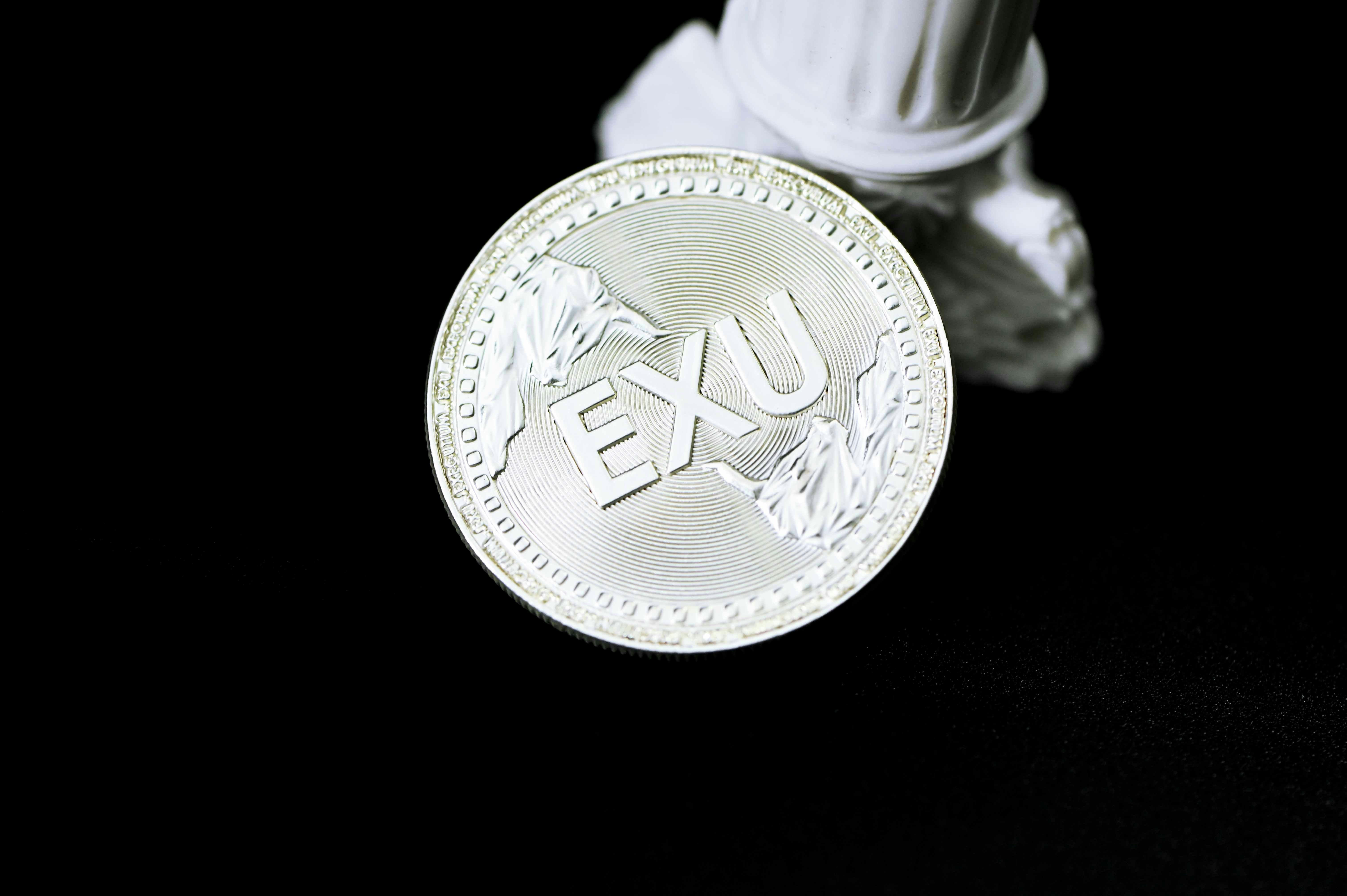 gold and silver round coin