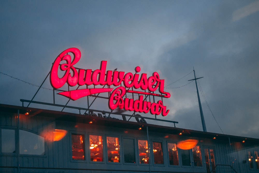 red and white love me neon light signage