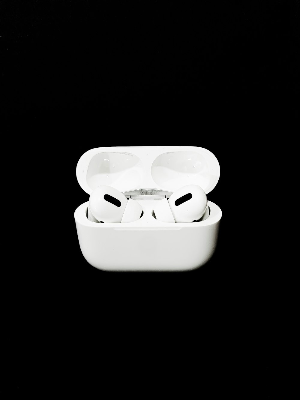 Weiße Apfel-Ohrhörer in weißem Etui
