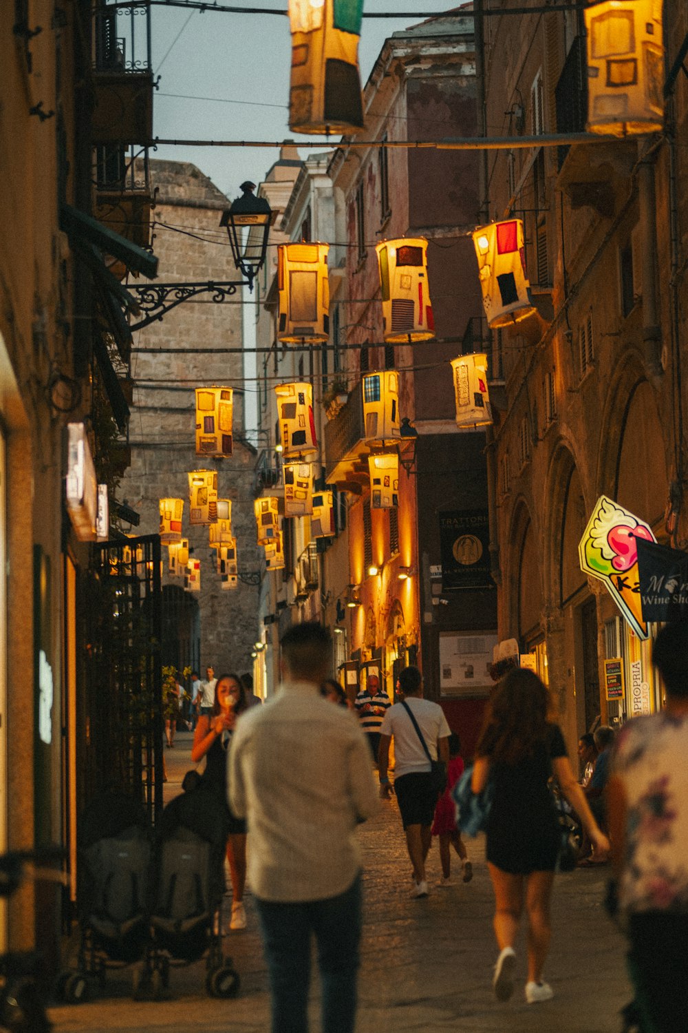 people walking on street during night time