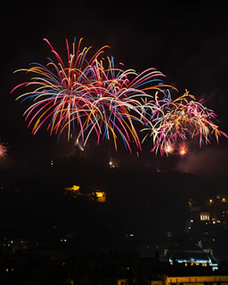 red and yellow fireworks display during nighttime