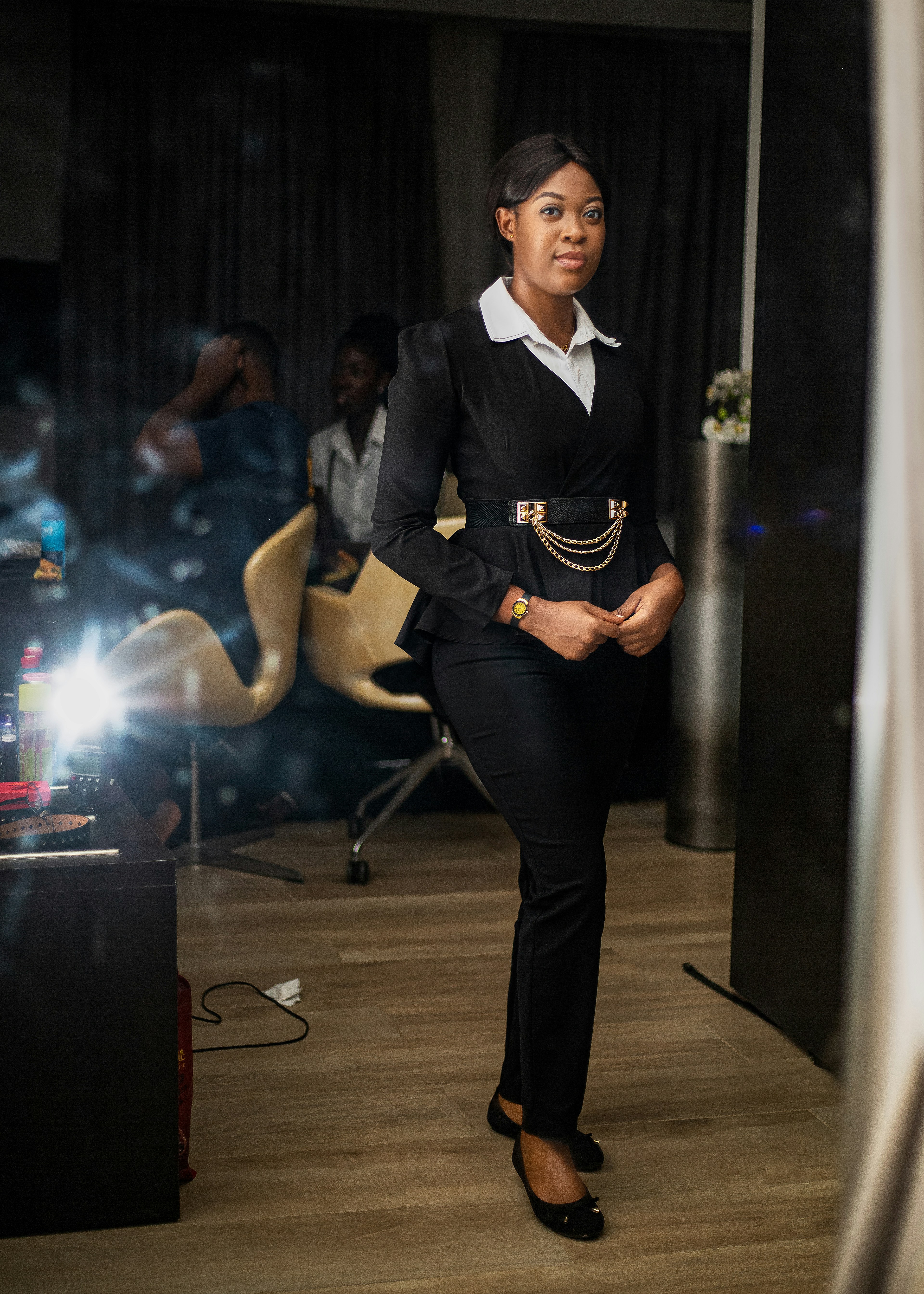 Professional woman with confident expression, representing successful workplace harassment case funding