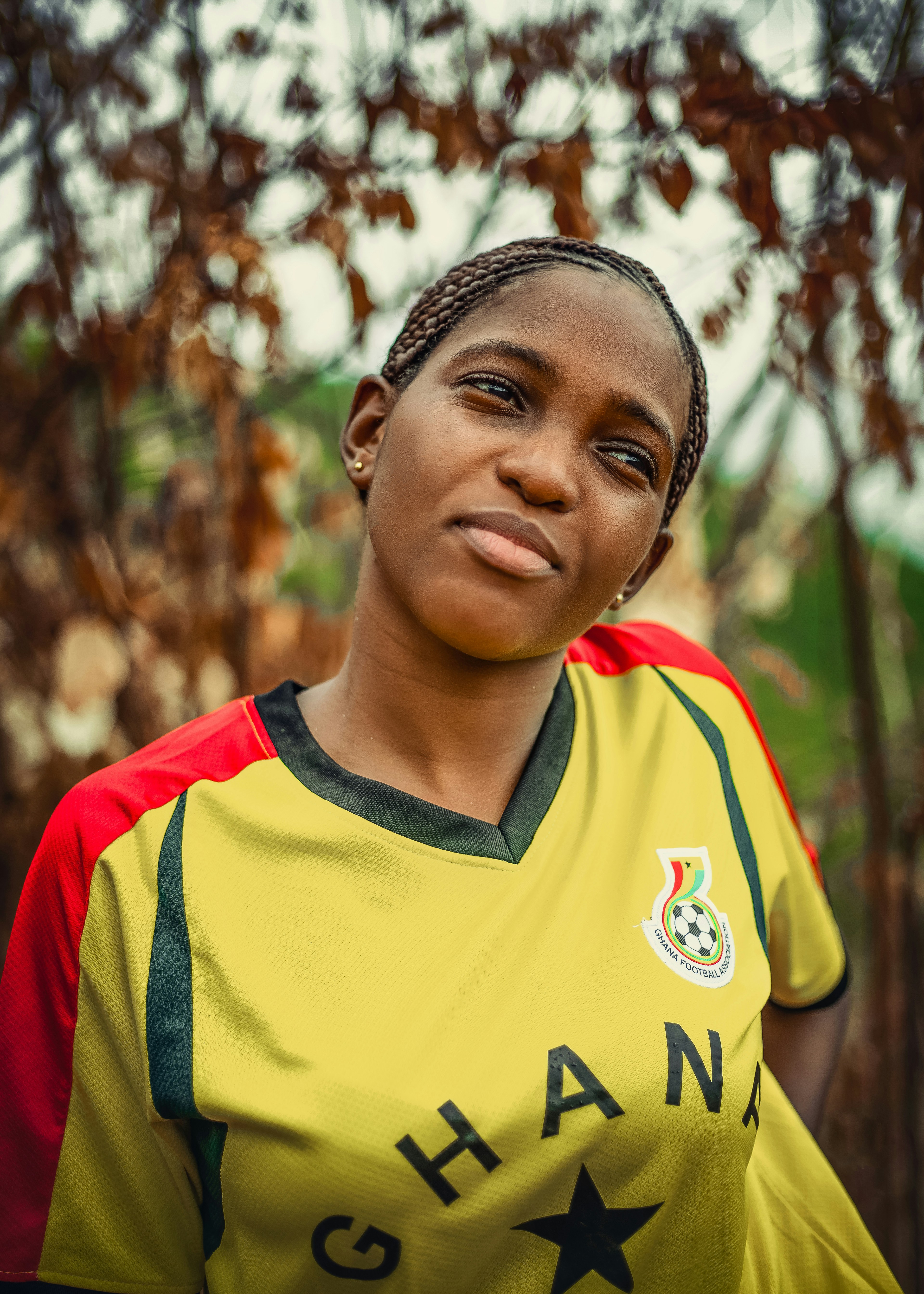 woman in yellow and red v neck shirt